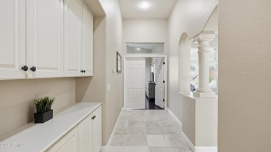 This beautiful single-story 3-bed + den, 2.5-bath home with a on The Foothills Golf Club in Arizona - for sale on GolfHomes.com, golf home, golf lot