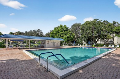 Discover this beautifully renovated 2-bed, 2-bath condo in the on Wynmoor Golf Course in Florida - for sale on GolfHomes.com, golf home, golf lot