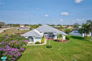 Welcome to this beautifully maintained 3-bedroom, 2-bathroom on Spring Lake Golf Resort in Florida - for sale on GolfHomes.com, golf home, golf lot