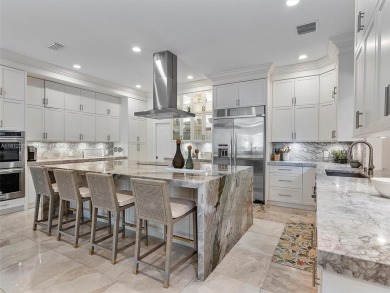 Discover a redefined standard of style and sophistication in on Weston Hills Country Club in Florida - for sale on GolfHomes.com, golf home, golf lot