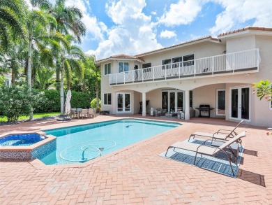 Discover a redefined standard of style and sophistication in on Weston Hills Country Club in Florida - for sale on GolfHomes.com, golf home, golf lot