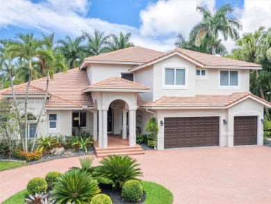 Discover a redefined standard of style and sophistication in on Weston Hills Country Club in Florida - for sale on GolfHomes.com, golf home, golf lot