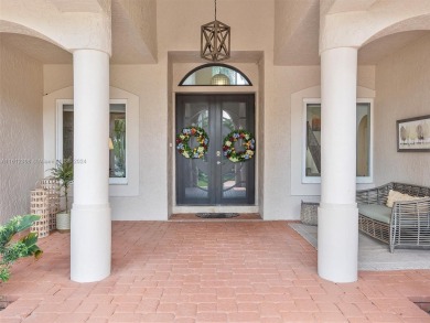 Discover a redefined standard of style and sophistication in on Weston Hills Country Club in Florida - for sale on GolfHomes.com, golf home, golf lot