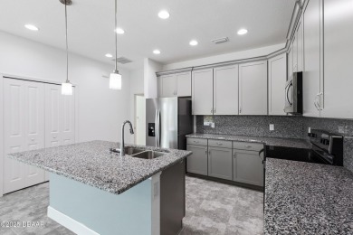 AMAZING NEW PRICE! Change your latitude and move into this on LPGA International Golf Course in Florida - for sale on GolfHomes.com, golf home, golf lot