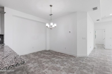AMAZING NEW PRICE! Change your latitude and move into this on LPGA International Golf Course in Florida - for sale on GolfHomes.com, golf home, golf lot