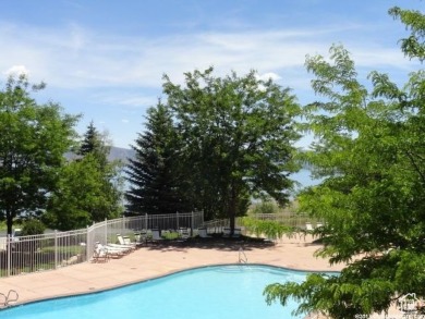 Upper Level south-end unit at Harbor Village in Tennis Building on Bear Lake Golf Course in Utah - for sale on GolfHomes.com, golf home, golf lot