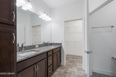 AMAZING NEW PRICE! Change your latitude and move into this on LPGA International Golf Course in Florida - for sale on GolfHomes.com, golf home, golf lot