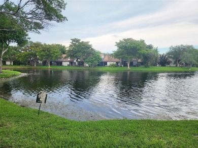 Perfect two-bedroom, 1.5 bath corner condo/ villa in Wimbledon on Jacaranda Golf Club in Florida - for sale on GolfHomes.com, golf home, golf lot