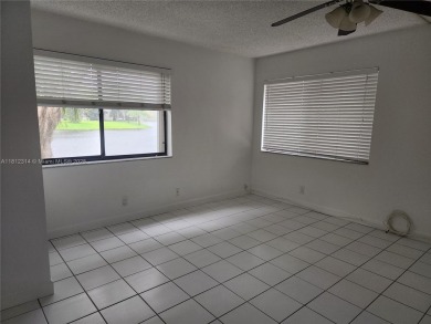 Perfect two-bedroom, 1.5 bath corner condo/ villa in Wimbledon on Jacaranda Golf Club in Florida - for sale on GolfHomes.com, golf home, golf lot