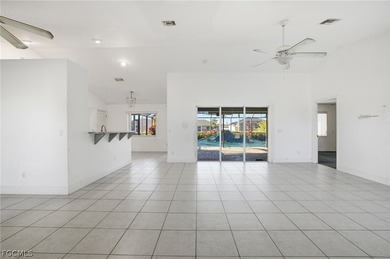 3-bedroom, 2-bath, 2-car garage pool home set on a wide on Del Tura Golf and Country Club in Florida - for sale on GolfHomes.com, golf home, golf lot