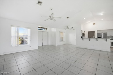 3-bedroom, 2-bath, 2-car garage pool home set on a wide on Del Tura Golf and Country Club in Florida - for sale on GolfHomes.com, golf home, golf lot