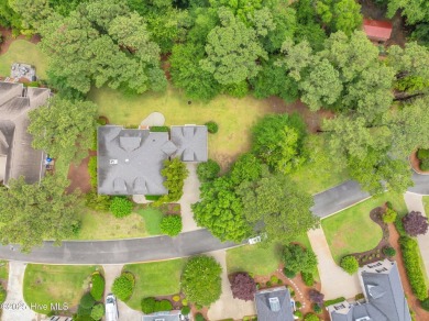 Come see this elegant brick home situated on a quiet street in on Porters Neck Country Club in North Carolina - for sale on GolfHomes.com, golf home, golf lot