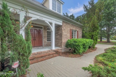 Come see this elegant brick home situated on a quiet street in on Porters Neck Country Club in North Carolina - for sale on GolfHomes.com, golf home, golf lot