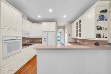 Come see this elegant brick home situated on a quiet street in on Porters Neck Country Club in North Carolina - for sale on GolfHomes.com, golf home, golf lot