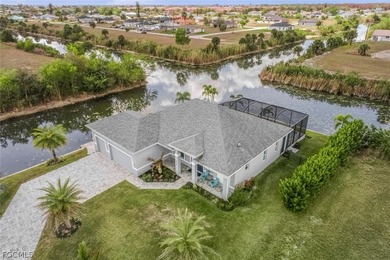 Turnkey Waterfront Pool Home on Intersecting Canal Lot | 3 Bed + on Del Tura Golf and Country Club in Florida - for sale on GolfHomes.com, golf home, golf lot