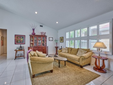 Welcome to this beautifully maintained 3-bedroom, 2.5-bathroom on Wycliffe Golf and Country Club in Florida - for sale on GolfHomes.com, golf home, golf lot