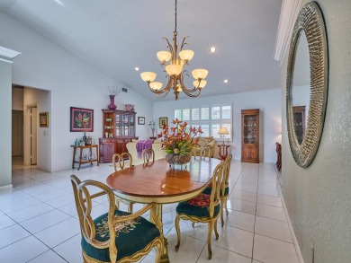 Welcome to this beautifully maintained 3-bedroom, 2.5-bathroom on Wycliffe Golf and Country Club in Florida - for sale on GolfHomes.com, golf home, golf lot