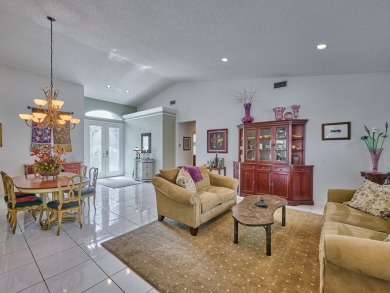 Welcome to this beautifully maintained 3-bedroom, 2.5-bathroom on Wycliffe Golf and Country Club in Florida - for sale on GolfHomes.com, golf home, golf lot
