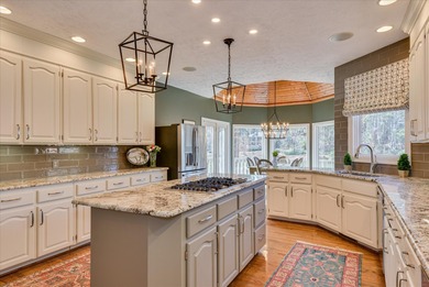 Updated waterfront home on a half-acre lot in Woodside featuring on Woodside Plantation Country Club in South Carolina - for sale on GolfHomes.com, golf home, golf lot