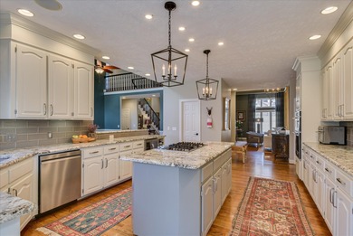 Updated waterfront home on a half-acre lot in Woodside featuring on Woodside Plantation Country Club in South Carolina - for sale on GolfHomes.com, golf home, golf lot