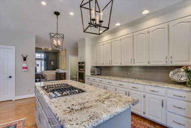 Updated waterfront home on a half-acre lot in Woodside featuring on Woodside Plantation Country Club in South Carolina - for sale on GolfHomes.com, golf home, golf lot