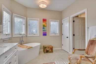 Updated waterfront home on a half-acre lot in Woodside featuring on Woodside Plantation Country Club in South Carolina - for sale on GolfHomes.com, golf home, golf lot