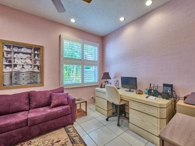 Welcome to this beautifully maintained 3-bedroom, 2.5-bathroom on Wycliffe Golf and Country Club in Florida - for sale on GolfHomes.com, golf home, golf lot