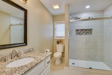 Updated waterfront home on a half-acre lot in Woodside featuring on Woodside Plantation Country Club in South Carolina - for sale on GolfHomes.com, golf home, golf lot