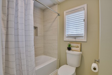 Updated waterfront home on a half-acre lot in Woodside featuring on Woodside Plantation Country Club in South Carolina - for sale on GolfHomes.com, golf home, golf lot