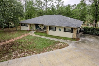 Close to town in Rainbow Springs Woodlands on a quiet Col-De-Sac on Rainbows End Golf Club in Florida - for sale on GolfHomes.com, golf home, golf lot