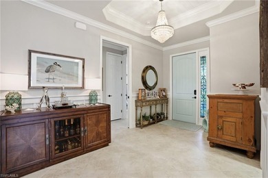 Experience elevated golf course living in this beautifully on Bonita National Golf Course in Florida - for sale on GolfHomes.com, golf home, golf lot