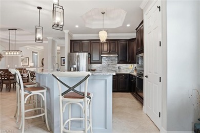 Experience elevated golf course living in this beautifully on Bonita National Golf Course in Florida - for sale on GolfHomes.com, golf home, golf lot