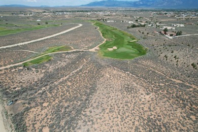 Discover the perfect blend of natural beauty and luxury living on Taos Country Club in New Mexico - for sale on GolfHomes.com, golf home, golf lot