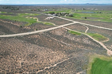 Discover the perfect blend of natural beauty and luxury living on Taos Country Club in New Mexico - for sale on GolfHomes.com, golf home, golf lot