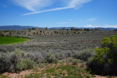 Discover the perfect blend of natural beauty and luxury living on Taos Country Club in New Mexico - for sale on GolfHomes.com, golf home, golf lot