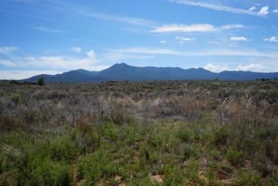 Discover the perfect blend of natural beauty and luxury living on Taos Country Club in New Mexico - for sale on GolfHomes.com, golf home, golf lot