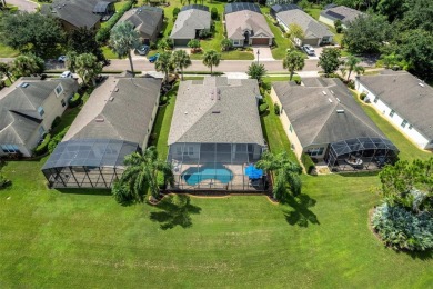 WATER VIEW POOL HOME!  GOLF CART included! Amazing water view on Ridgewood Lakes Golf and Country Club in Florida - for sale on GolfHomes.com, golf home, golf lot