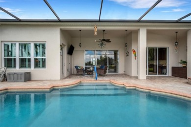 WATER VIEW POOL HOME!  GOLF CART included! Amazing water view on Ridgewood Lakes Golf and Country Club in Florida - for sale on GolfHomes.com, golf home, golf lot