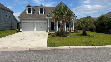 Nestled in the sought after community of Murrells Inlet, this on International Club of Myrtle Beach in South Carolina - for sale on GolfHomes.com, golf home, golf lot