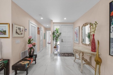 BEAUTIFULLY RENOVATED HOME WITH BREATHTAKING LAKE VIEWS on Boca West Golf and Country Club in Florida - for sale on GolfHomes.com, golf home, golf lot