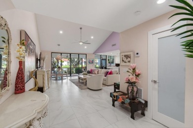 BEAUTIFULLY RENOVATED HOME WITH BREATHTAKING LAKE VIEWS on Boca West Golf and Country Club in Florida - for sale on GolfHomes.com, golf home, golf lot