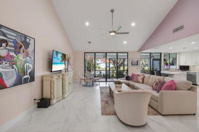 BEAUTIFULLY RENOVATED HOME WITH BREATHTAKING LAKE VIEWS on Boca West Golf and Country Club in Florida - for sale on GolfHomes.com, golf home, golf lot