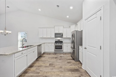 Nestled in the sought after community of Murrells Inlet, this on International Club of Myrtle Beach in South Carolina - for sale on GolfHomes.com, golf home, golf lot