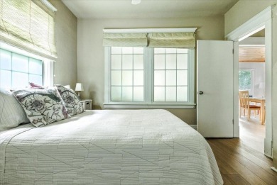 Beach vibes and vintage charm in this historic Grand Beach home on Grand Beach Municipal Golf Course in Michigan - for sale on GolfHomes.com, golf home, golf lot