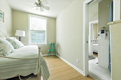 Beach vibes and vintage charm in this historic Grand Beach home on Grand Beach Municipal Golf Course in Michigan - for sale on GolfHomes.com, golf home, golf lot