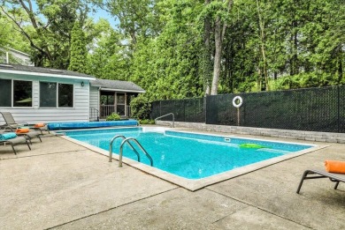 Beach vibes and vintage charm in this historic Grand Beach home on Grand Beach Municipal Golf Course in Michigan - for sale on GolfHomes.com, golf home, golf lot