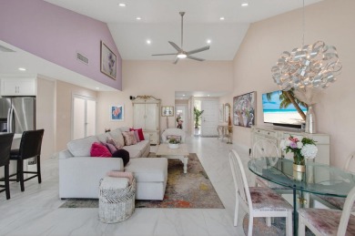 BEAUTIFULLY RENOVATED HOME WITH BREATHTAKING LAKE VIEWS on Boca West Golf and Country Club in Florida - for sale on GolfHomes.com, golf home, golf lot