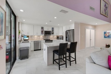 BEAUTIFULLY RENOVATED HOME WITH BREATHTAKING LAKE VIEWS on Boca West Golf and Country Club in Florida - for sale on GolfHomes.com, golf home, golf lot