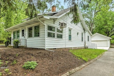 Beach vibes and vintage charm in this historic Grand Beach home on Grand Beach Municipal Golf Course in Michigan - for sale on GolfHomes.com, golf home, golf lot