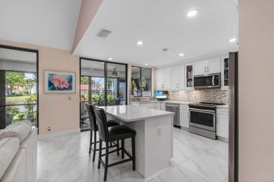 BEAUTIFULLY RENOVATED HOME WITH BREATHTAKING LAKE VIEWS on Boca West Golf and Country Club in Florida - for sale on GolfHomes.com, golf home, golf lot